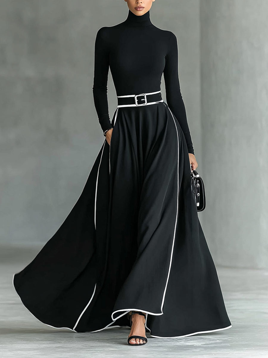 Elisa | Vestido maxi negro con costuras blancas y cuello alto