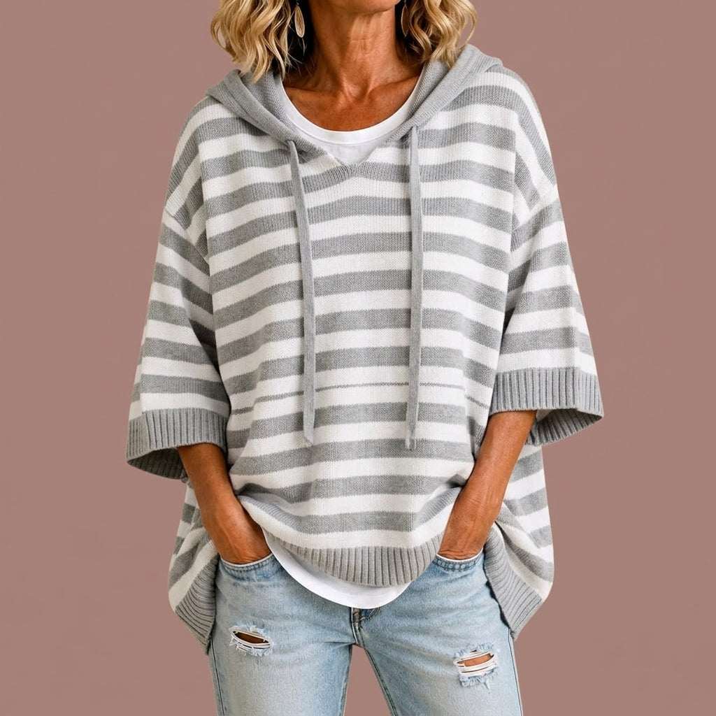 Carmina | Poncho de punto a rayas con capucha