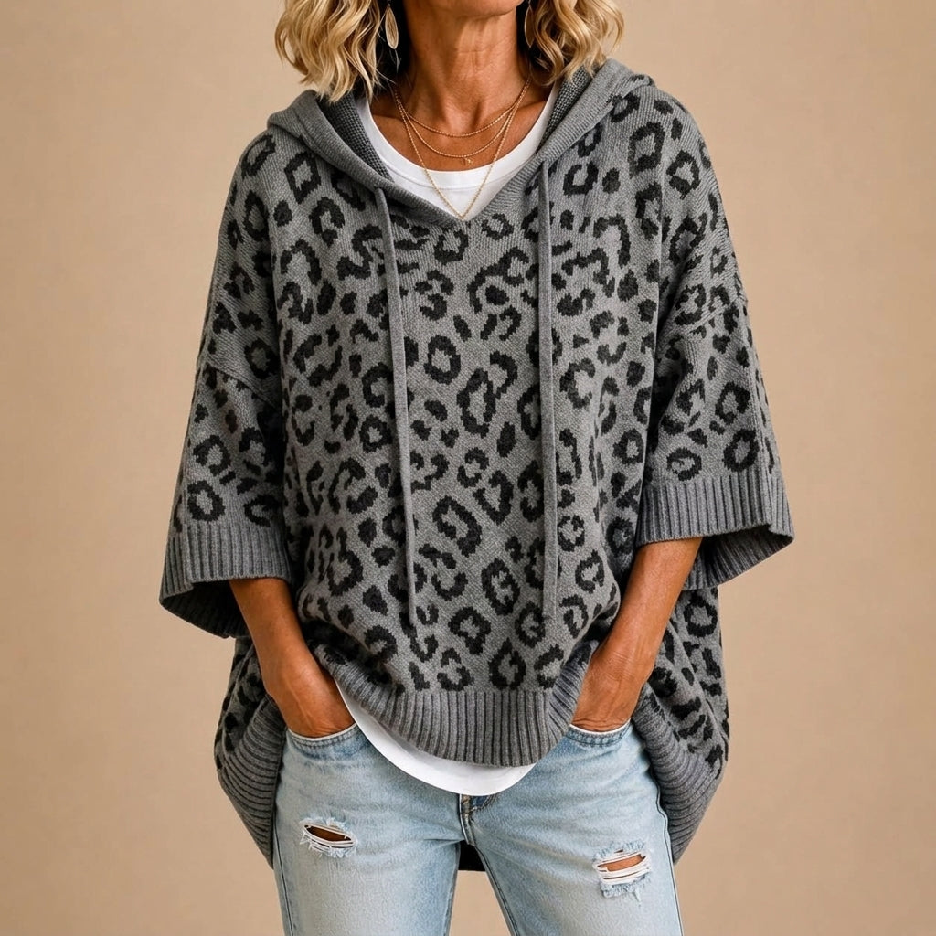 Paz | Poncho de punto con estampado animal y capucha