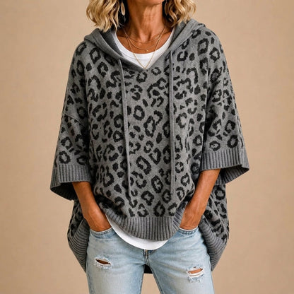 Paz | Poncho de punto con estampado animal y capucha